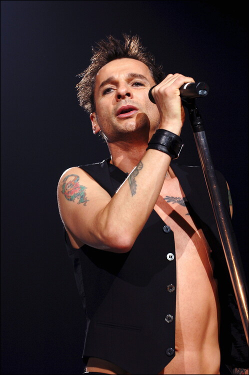 Poster Depeche Mode performs live at the