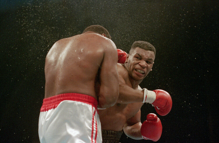 Poster Mike Tyson Delivers KO Punch To Larry Holmes